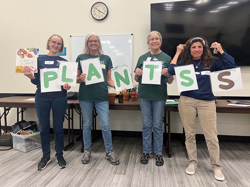 Master gardeners (left to right) Deb, Doreen, Suzanne, and Carol during a Junior Master Gardener after-school event at South Valleys Library. Photo courtesy of Rachel McClure