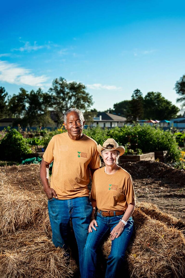 Earstin and Dolores (Dee) Schafer-Whitten, cofounders of Soulful Seeds in Reno, sit near tomato plants. Photo by Donna Victor