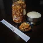 Kimchi and rice prepared at Arario. Photo by Brooke Reyes, Dreampilot Films