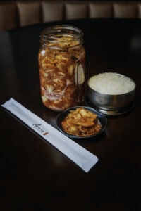 Kimchi and rice prepared at Arario. Photo by Brooke Reyes, Dreampilot Films