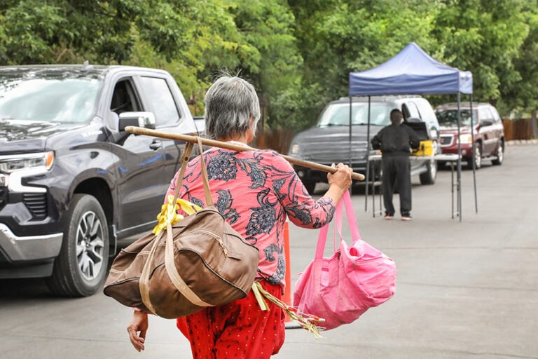 A neighbor finds an inventive way to bring her fresh produce home from the Food Bank of Northern Nevada Mobile Harvest Program event