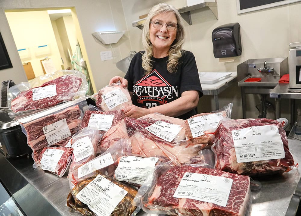 Teri Gitthens, market manager of the butcher shop, displays a huge selection of fresh Park Ranch Meats