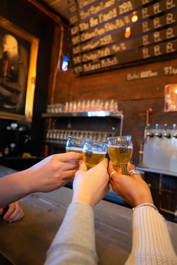 Participants on a tour raise a glass at Pigeon Head Brewery in Reno. Photo courtesy of City Brew Tours