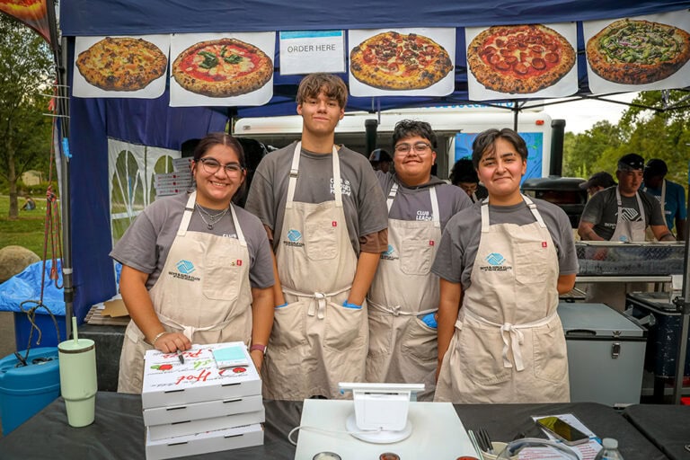 From left, Jacqueline Ornelas (age 16), Horatio Lopez (age 14), Angel Gutierrez (age 15), and Alejandro Gonzalez (age 16), who all are members of the Boys & Girls Club of Truckee Meadows' Club Leaders Program, operate at the organization's food truck during summer at Food Truck Friday in Reno