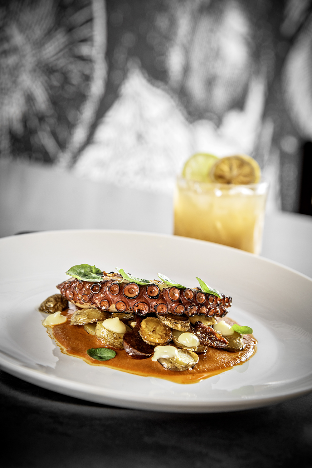 Spanish octopus with tamarindo rush cocktail